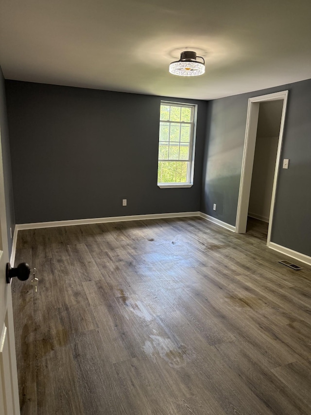 975 Witcher Hollow Rd, Red Boiling Springs, TN 37150 - empty room with dark wood finished floors