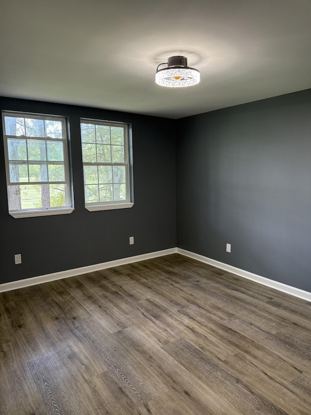 975 Witcher Hollow Rd, Red Boiling Springs, TN 37150 - empty room featuring dark wood-style flooring and baseboards