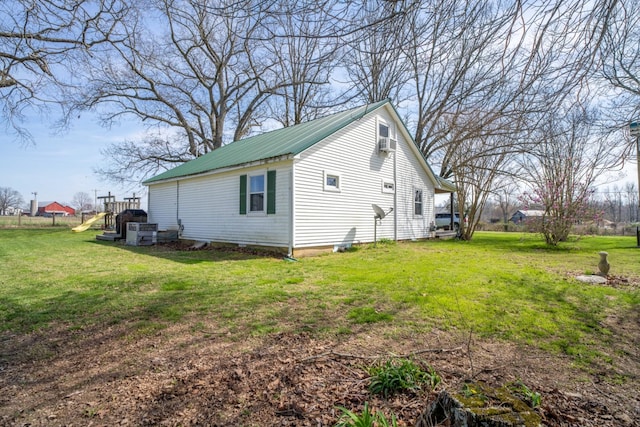 135 Campbellsville Pike, Ethridge, TN 38456 - view of property exterior with a yard and a metal roof
