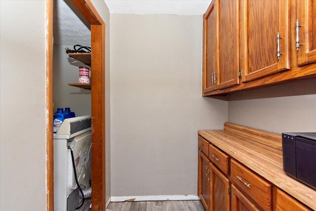 135 Campbellsville Pike, Ethridge, TN 38456 - laundry area with baseboards and wood finished floors