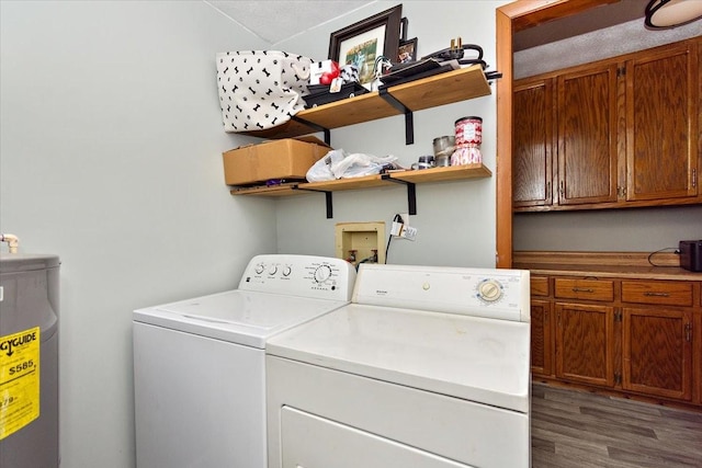 135 Campbellsville Pike, Ethridge, TN 38456 - laundry area with independent washer and dryer, water heater, cabinet space, and wood finished floors