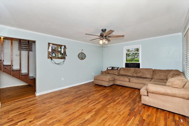135 Campbellsville Pike, Ethridge, TN 38456 - living area with light wood-style floors, crown molding, ceiling fan, and stairway