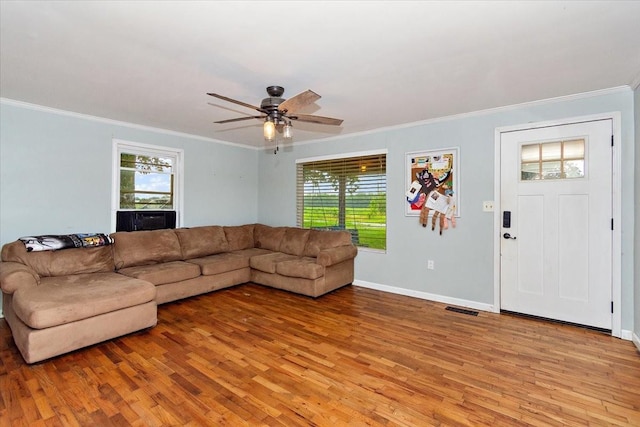 135 Campbellsville Pike, Ethridge, TN 38456 - living room with crown molding, light wood-style flooring, cooling unit, and a ceiling fan