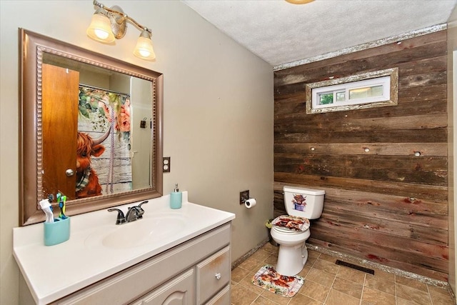 135 Campbellsville Pike, Ethridge, TN 38456 - full bath featuring wooden walls, vanity, a textured ceiling, and tile patterned floors
