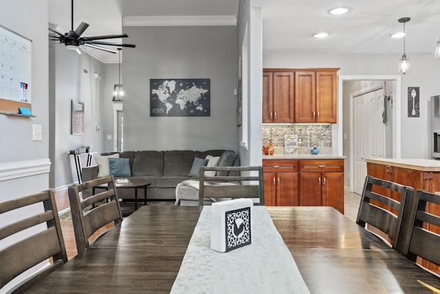 1386 Bruceton Dr, Clarksville, TN 37042 - dining area with ceiling fan, crown molding, recessed lighting, and wood finished floors