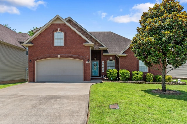 1386 Bruceton Dr, Clarksville, TN 37042 - traditional-style house with brick siding, concrete driveway, a front yard, a garage, and a shingled roof