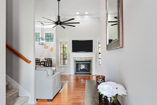 1386 Bruceton Dr, Clarksville, TN 37042 - living room with ceiling fan, light wood-style floors, stairs, crown molding, and recessed lighting
