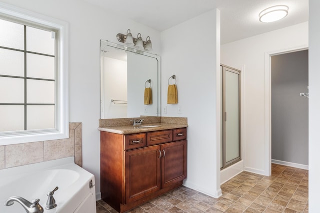 1386 Bruceton Dr, Clarksville, TN 37042 - bathroom featuring vanity, a shower stall, and a garden tub