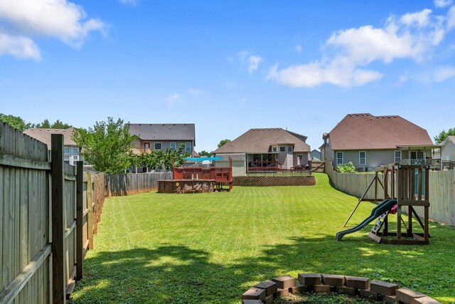 1386 Bruceton Dr, Clarksville, TN 37042 - fenced backyard featuring a playground and a residential view