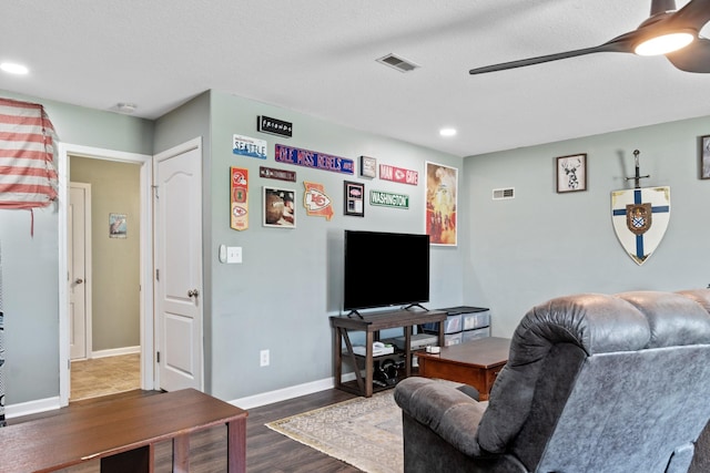 1386 Bruceton Dr, Clarksville, TN 37042 - living area featuring dark wood-style flooring, ceiling fan, recessed lighting, and a textured ceiling