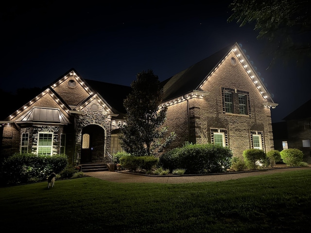 517 Burnett Rd, Mount Juliet, TN 37122 - view of front of home featuring a lawn, brick siding, and stone siding