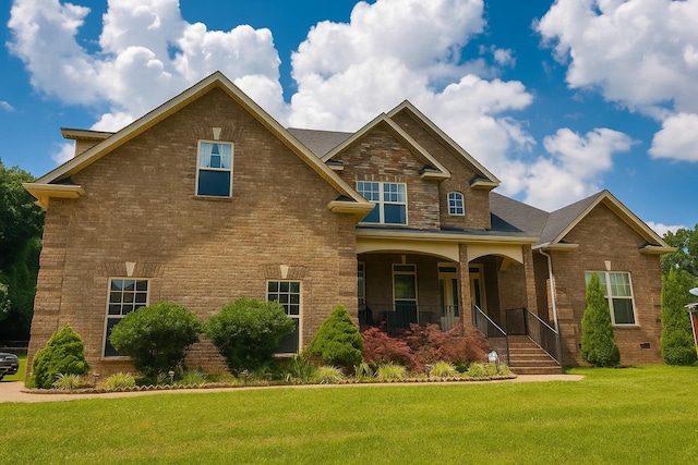 2028 Martins Bend Dr, La Vergne, TN 37086 - view of front of house featuring covered porch, a front yard, and brick siding