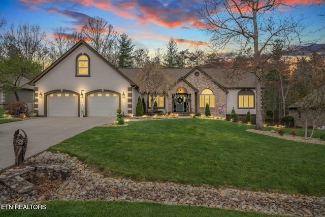 187 Forest View Dr, Crossville, TN 38558 - view of front of house with driveway, stucco siding, and a lawn