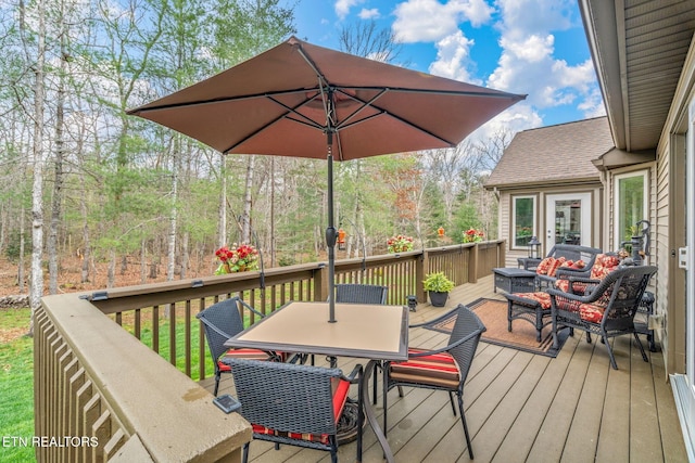 187 Forest View Dr, Crossville, TN 38558 - wooden terrace with outdoor lounge area and outdoor dining area