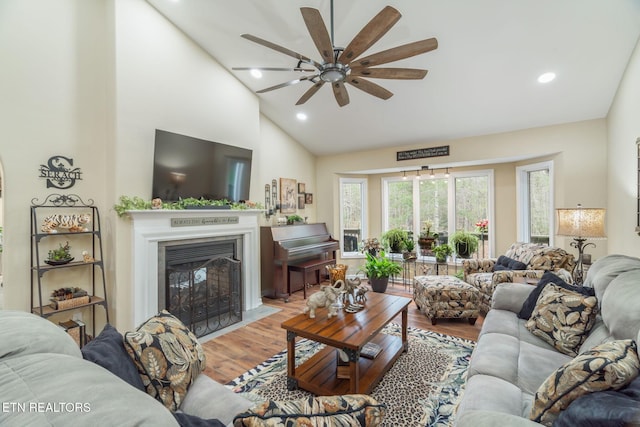 187 Forest View Dr, Crossville, TN 38558 - living area with ceiling fan, wood finished floors, a fireplace with flush hearth, recessed lighting, and high vaulted ceiling