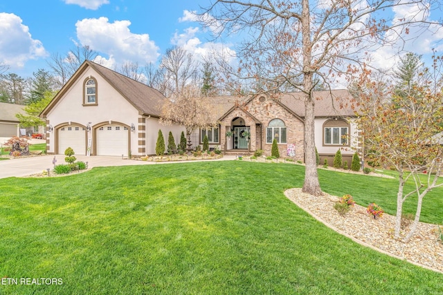 187 Forest View Dr, Crossville, TN 38558 - view of front facade with stucco siding, driveway, a front yard, and stone siding