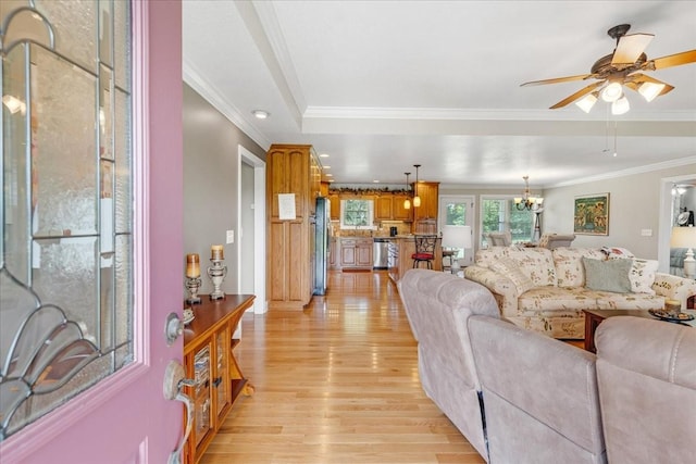 379 Hooper Rd, Winchester, TN 37398 - living room with light wood-style floors, a ceiling fan, crown molding, and a chandelier