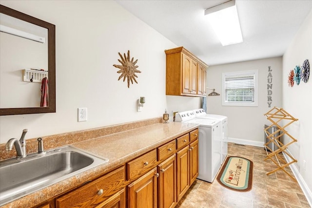 379 Hooper Rd, Winchester, TN 37398 - laundry area with cabinet space, washer and dryer, and stone finish floors