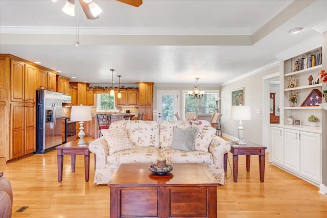 379 Hooper Rd, Winchester, TN 37398 - living room with ceiling fan, light wood-type flooring, a chandelier, and crown molding