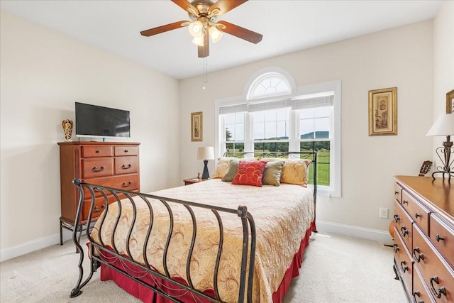 379 Hooper Rd, Winchester, TN 37398 - bedroom featuring light colored carpet, multiple windows, and ceiling fan