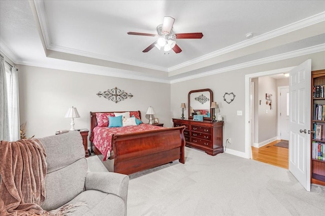 379 Hooper Rd, Winchester, TN 37398 - bedroom featuring ornamental molding, a raised ceiling, light colored carpet, and ceiling fan