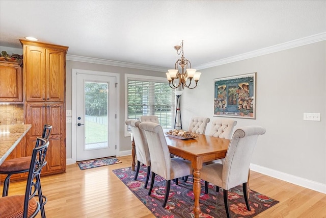 379 Hooper Rd, Winchester, TN 37398 - dining room with a chandelier, light wood finished floors, and crown molding