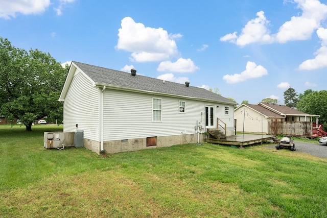105 Gammons Ln, Lafayette, TN 37083 - rear view of property with crawl space, a lawn, a wooden deck, and entry steps