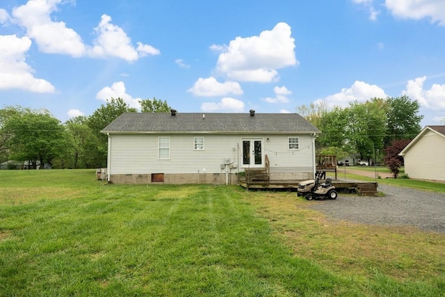 105 Gammons Ln, Lafayette, TN 37083 - back of property featuring a lawn, french doors, crawl space, and a wooden deck