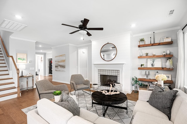 2636 Bramblewood Ln, Thompsons Station, TN 37179 - living area featuring stairway, ceiling fan, wood finished floors, crown molding, and recessed lighting