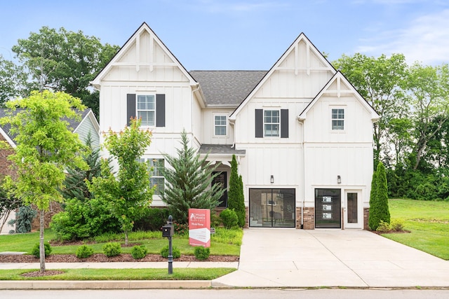2636 Bramblewood Ln, Thompsons Station, TN 37179 - modern farmhouse with board and batten siding, a shingled roof, and concrete driveway