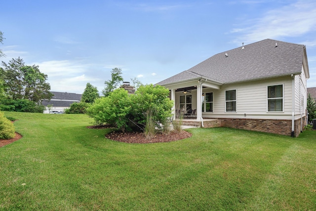 2636 Bramblewood Ln, Thompsons Station, TN 37179 - back of house featuring ceiling fan, a yard, a patio, and a shingled roof