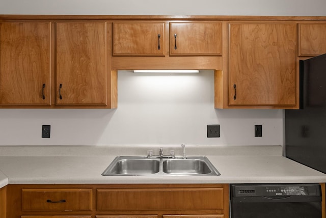 3230 S Senseney Cir, Clarksville, TN 37042 - kitchen with black dishwasher, light countertops, and brown cabinets