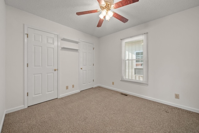 3230 S Senseney Cir, Clarksville, TN 37042 - unfurnished bedroom featuring carpet flooring, a textured ceiling, and ceiling fan