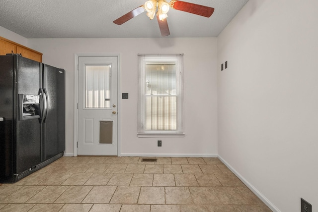 3230 S Senseney Cir, Clarksville, TN 37042 - unfurnished dining area with a ceiling fan and light tile patterned floors