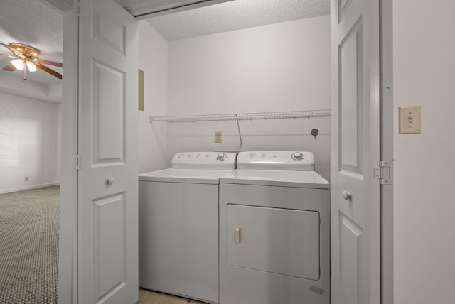 3230 S Senseney Cir, Clarksville, TN 37042 - laundry room featuring a textured ceiling, washing machine and clothes dryer, and ceiling fan