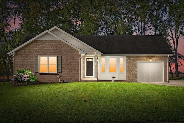 3230 S Senseney Cir, Clarksville, TN 37042 - ranch-style house with an attached garage, brick siding, driveway, and a front yard
