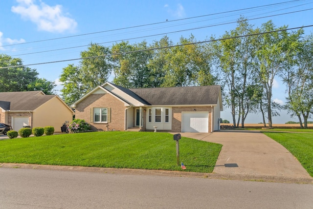 3230 S Senseney Cir, Clarksville, TN 37042 - ranch-style home featuring brick siding, an attached garage, driveway, and a front yard