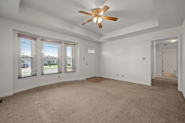 3230 S Senseney Cir, Clarksville, TN 37042 - empty room featuring a tray ceiling, ornamental molding, carpet, a ceiling fan, and a textured ceiling