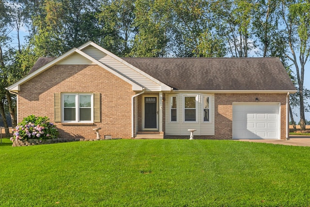 3230 S Senseney Cir, Clarksville, TN 37042 - view of front facade with a garage, a front lawn, brick siding, and driveway