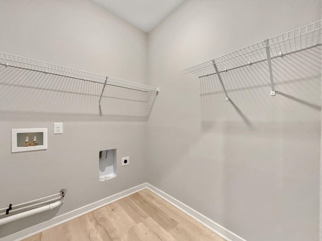 795 Ewell Farm Dr, Spring Hill, TN 37174 - washroom featuring light wood-style flooring, electric dryer hookup, and washer hookup