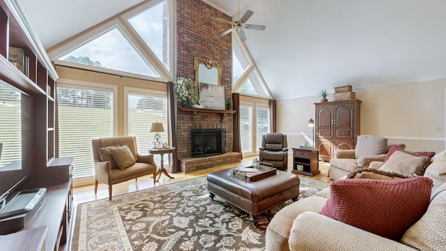 938 Thompson Rd, Pegram, TN 37143 - living room with ceiling fan, a brick fireplace, high vaulted ceiling, and light wood-style floors
