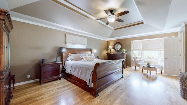 938 Thompson Rd, Pegram, TN 37143 - bedroom with a tray ceiling, light wood finished floors, ornamental molding, and ceiling fan