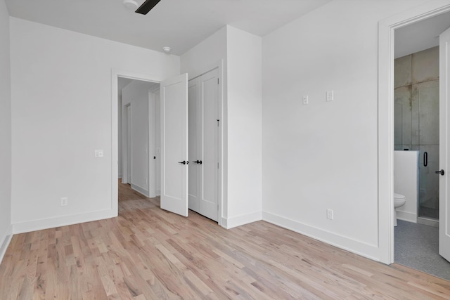 419 Acklen Park Dr, Nashville, TN 37205 - unfurnished bedroom with wood finished floors and ensuite bathroom