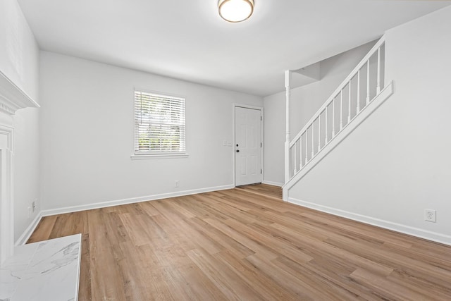 601 Boyd Mill Ave Unit O4, Franklin, TN 37064 - entrance foyer with light wood-style floors and stairs