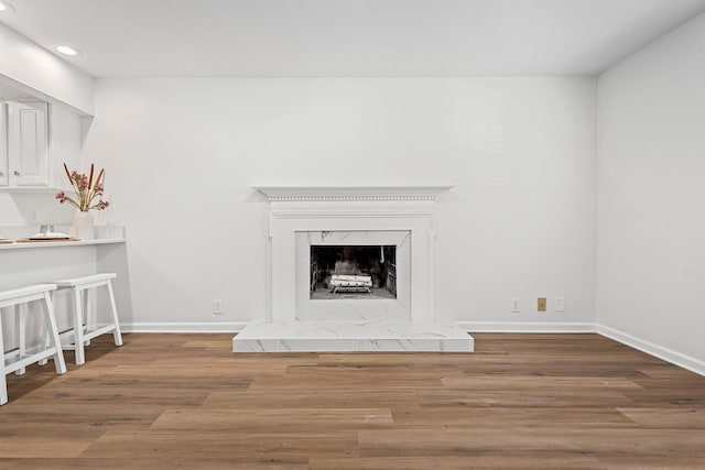 601 Boyd Mill Ave Unit O4, Franklin, TN 37064 - unfurnished living room with recessed lighting, wood finished floors, and a fireplace