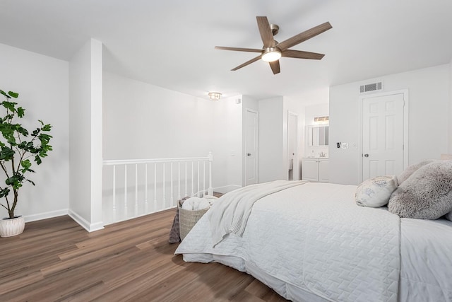601 Boyd Mill Ave Unit O4, Franklin, TN 37064 - bedroom featuring wood finished floors, a ceiling fan, and connected bathroom