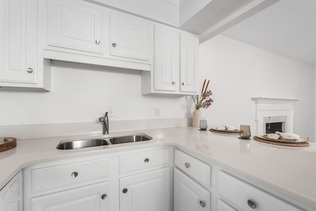 601 Boyd Mill Ave Unit O4, Franklin, TN 37064 - kitchen with white cabinetry, light countertops, and dishwasher