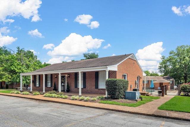 601 Boyd Mill Ave Unit O4, Franklin, TN 37064 - ranch-style house with brick siding, a gate, and a porch
