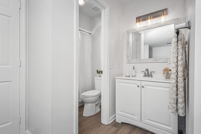 601 Boyd Mill Ave Unit O4, Franklin, TN 37064 - full bathroom featuring vanity, wood finished floors, and curtained shower