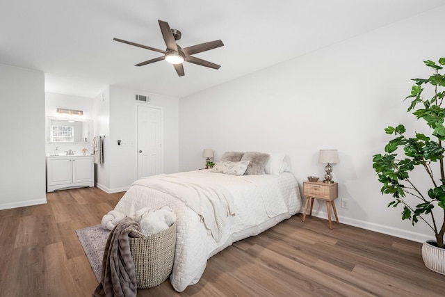 601 Boyd Mill Ave Unit O4, Franklin, TN 37064 - bedroom with wood finished floors, a ceiling fan, and ensuite bathroom